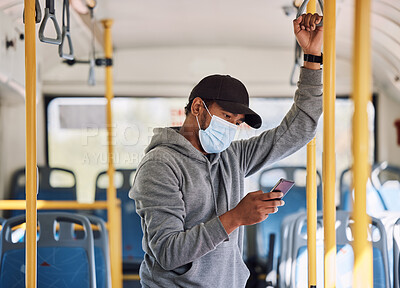 Mixed race man travelling by bus in the city