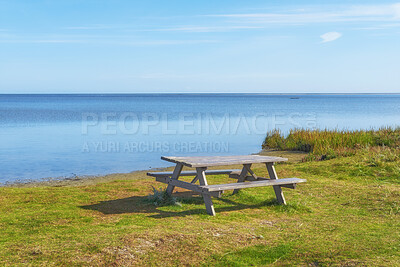 Buy stock photo Public table and bench at the beach