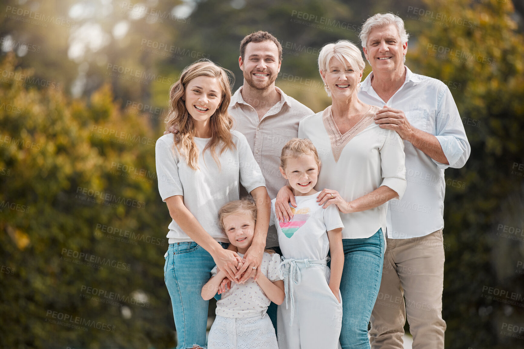 Buy stock photo Portrait of big family in garden together with smile, grandparents and parents with kids in backyard. Nature, happiness and men, women and children in park with love, support and outdoor bonding.