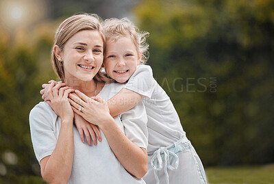 Buy stock photo Nature, hugging and portrait of kid with mother in an outdoor garden bonding together. Happy, smile and girl child embracing her young mom from Canada with love and care in the park or field.