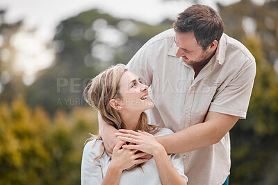 Buy stock photo Outdoor, hug and couple with love, happiness and relax with support, bonding together and weekend break. Outside, man and woman with joy, marriage and embrace with relationship, cheerful and smile