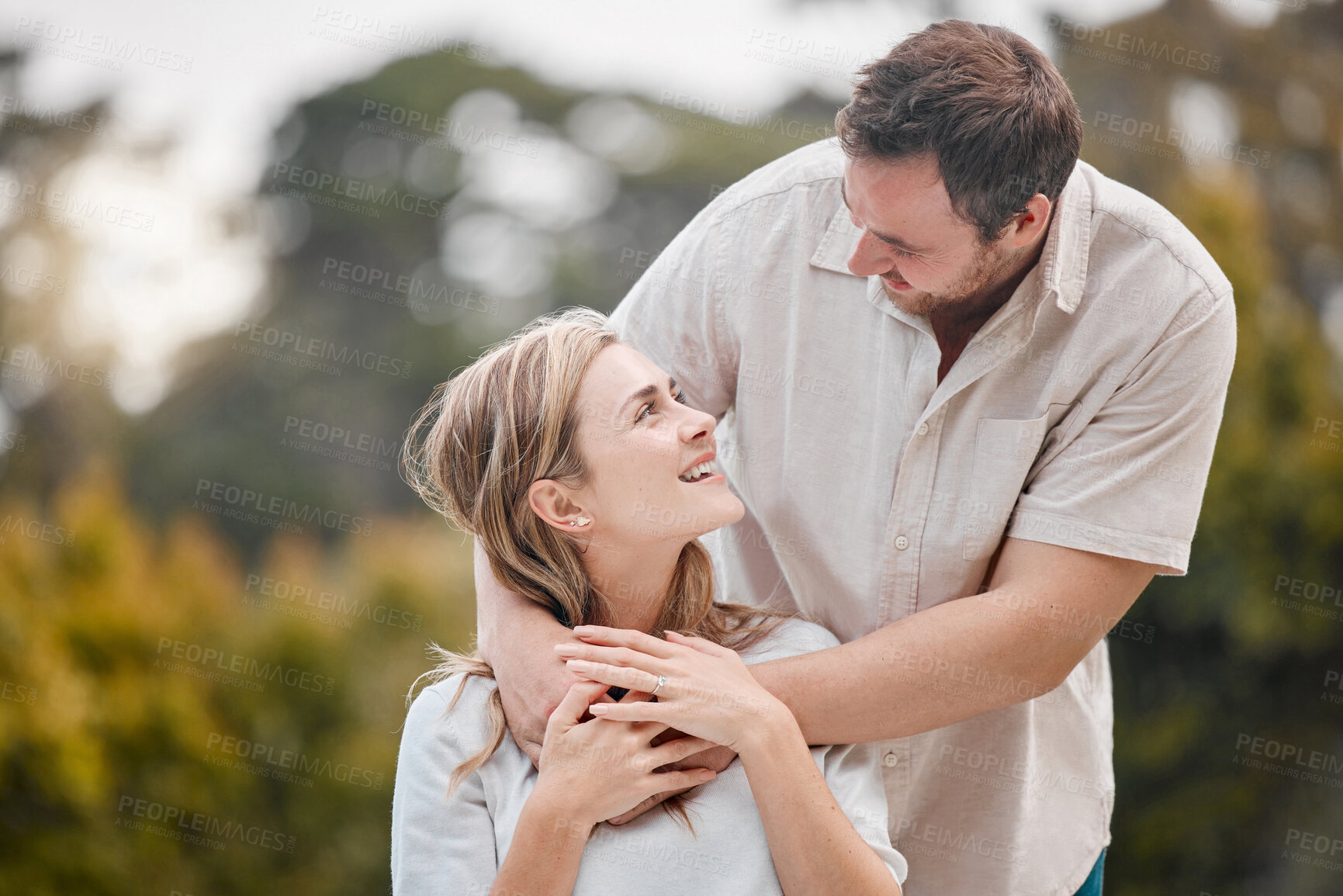 Buy stock photo Outdoor, hug and couple with love, happiness and relax with support, bonding together and weekend break. Outside, man and woman with joy, marriage and embrace with relationship, cheerful and smile