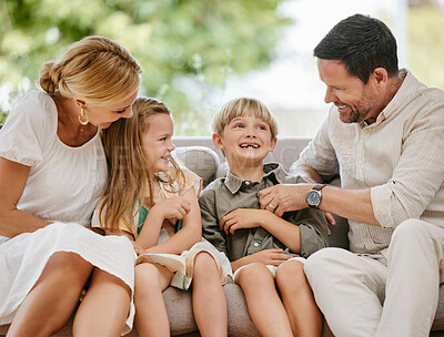 Buy stock photo Family, tickle and play on sofa, laughing and bonding at home, fun and silly humor or comedy. Parents and children, connection and security in relationship, happy and care on couch, love and goofy