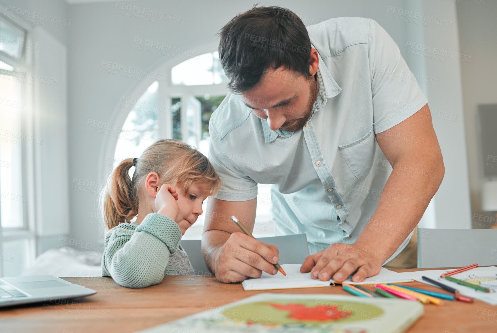 Buy stock photo Father, girl and writing in book for homework, teaching or helping child in support at home. Dad or parent drawing with little kid for learning, education or homeschooling together on table at house