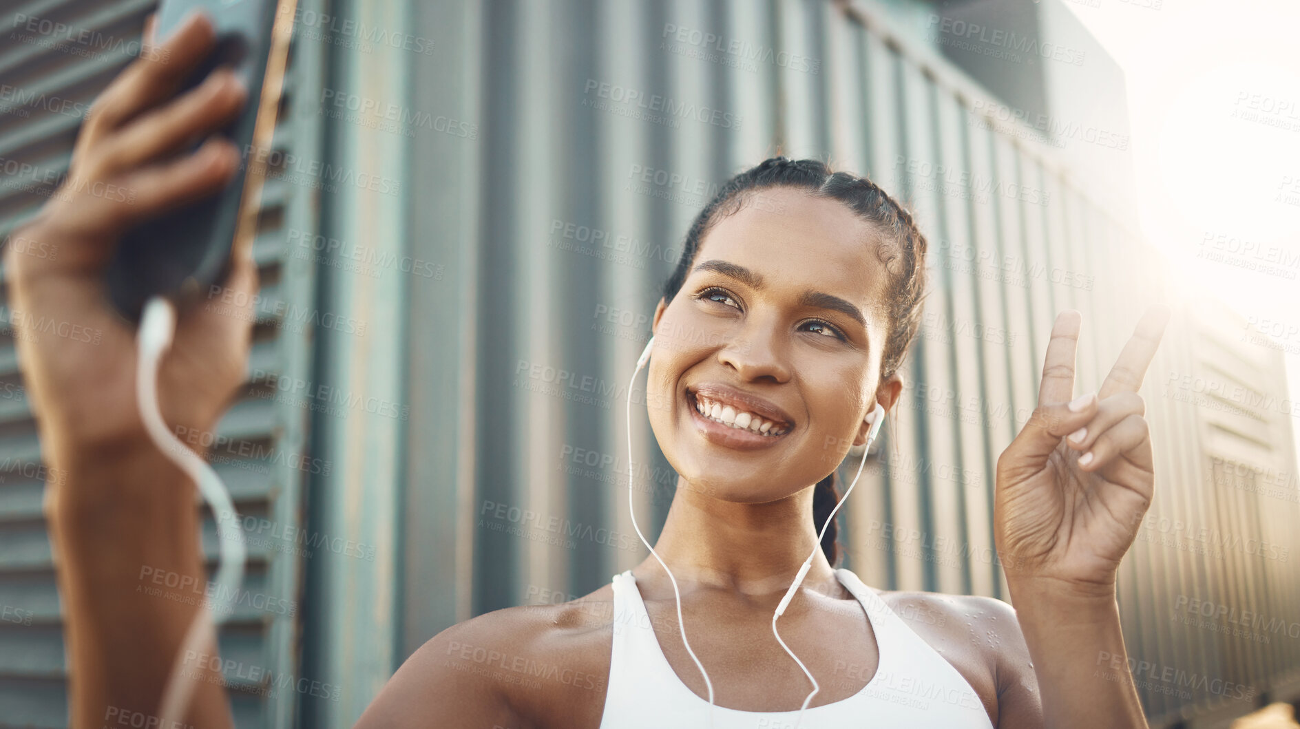 Buy stock photo Fitness, selfie or happy woman in city with peace sign listening to music or radio in sports exercise. Mobile photography, smile or girl athlete runner taking pictures in training workout outdoors 