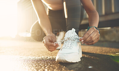 Buy stock photo Tie, street or hands of person with shoelace for fitness training, exercise or running workout on road. Lace, zoom or leg of sports athlete with footwear ready to start exercising on ground in city