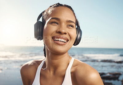 Buy stock photo Thinking, headphones and woman at beach fitness, exercise or running mindset, training goals or inspiration music. Health, podcast and athlete, runner or sports person, sea listen and audio streaming