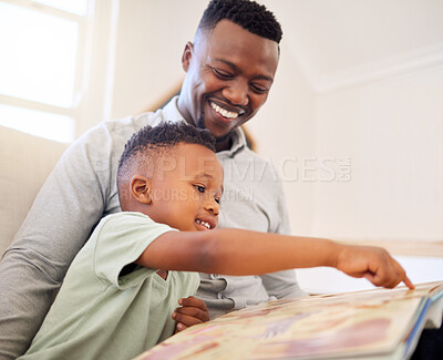Buy stock photo African, father and child in home reading book on sofa with development of language, education and learning. Happy dad, teaching and show kid a storytelling in books and relax in living room on couch