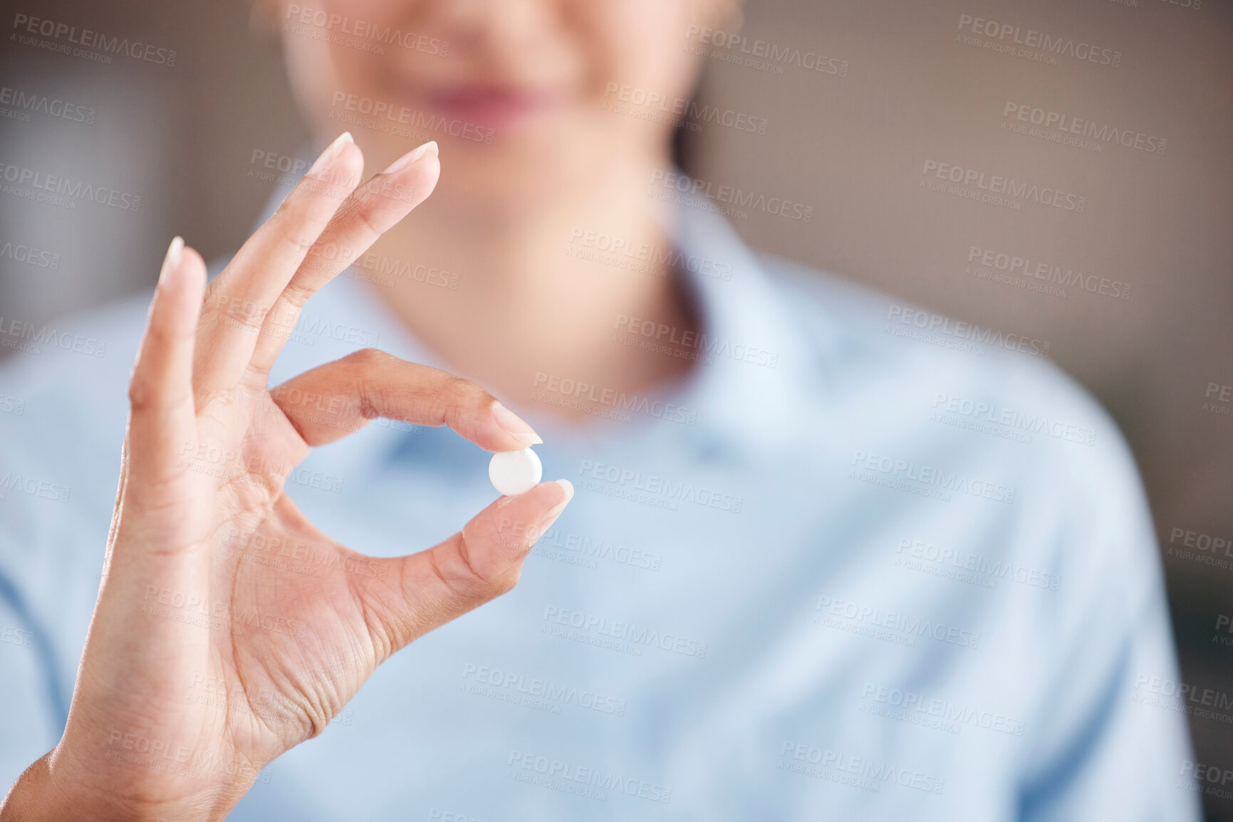 Buy stock photo Hand, medicine or pill with a woman closeup for healthcare advice for medical treatment and cure. Tablet, wellness and pharmaceutical drug for vitamin or mineral supplement in the fingers of a person