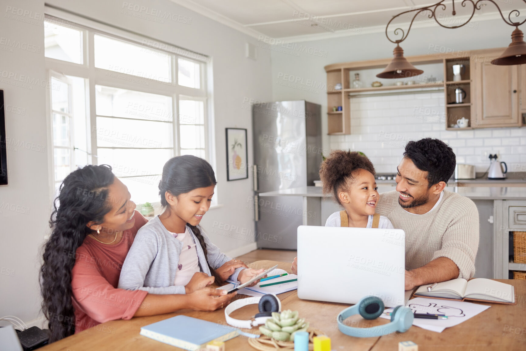 Buy stock photo Elearning, laptop and parents with their kids in the dining room of their family house. Technology, home school and children students working on online homework with their mother and father at home.