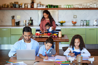 Buy stock photo Family working at a kitchen table, doing homework at home. A young man using a laptop next to his children. A little boy and girl playing while their father is online. Remote learning in quarantine