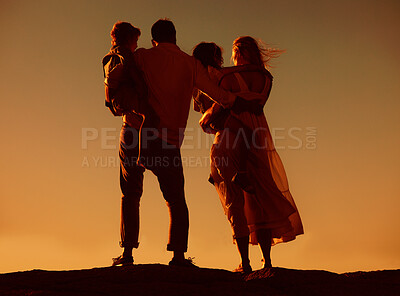 Buy stock photo Parents, children and silhouette on mountain, sunset and hug with love, care and summer adventure. Mother, father and young kids with sky background, bond and outdoor on holiday, vacation or journey