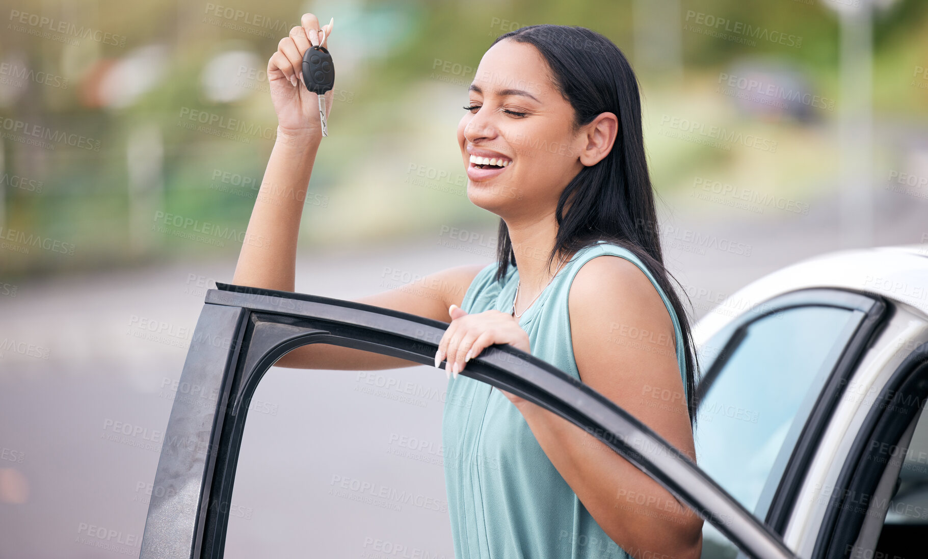 Buy stock photo Excited, happy woman driver with new car, key and smile on face with loan, auto insurance and luxury transport. Happiness, freedom to drive and proud customer with keys for motor vehicle in street.