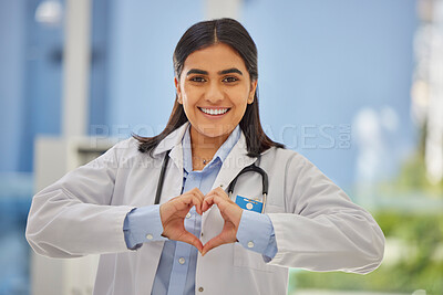 Buy stock photo Doctor, heart hands and portrait of woman in hospital with support, kindness and trust in healthcare. Health care, insurance and female medical professional with love hand gesture or emoji in clinic.