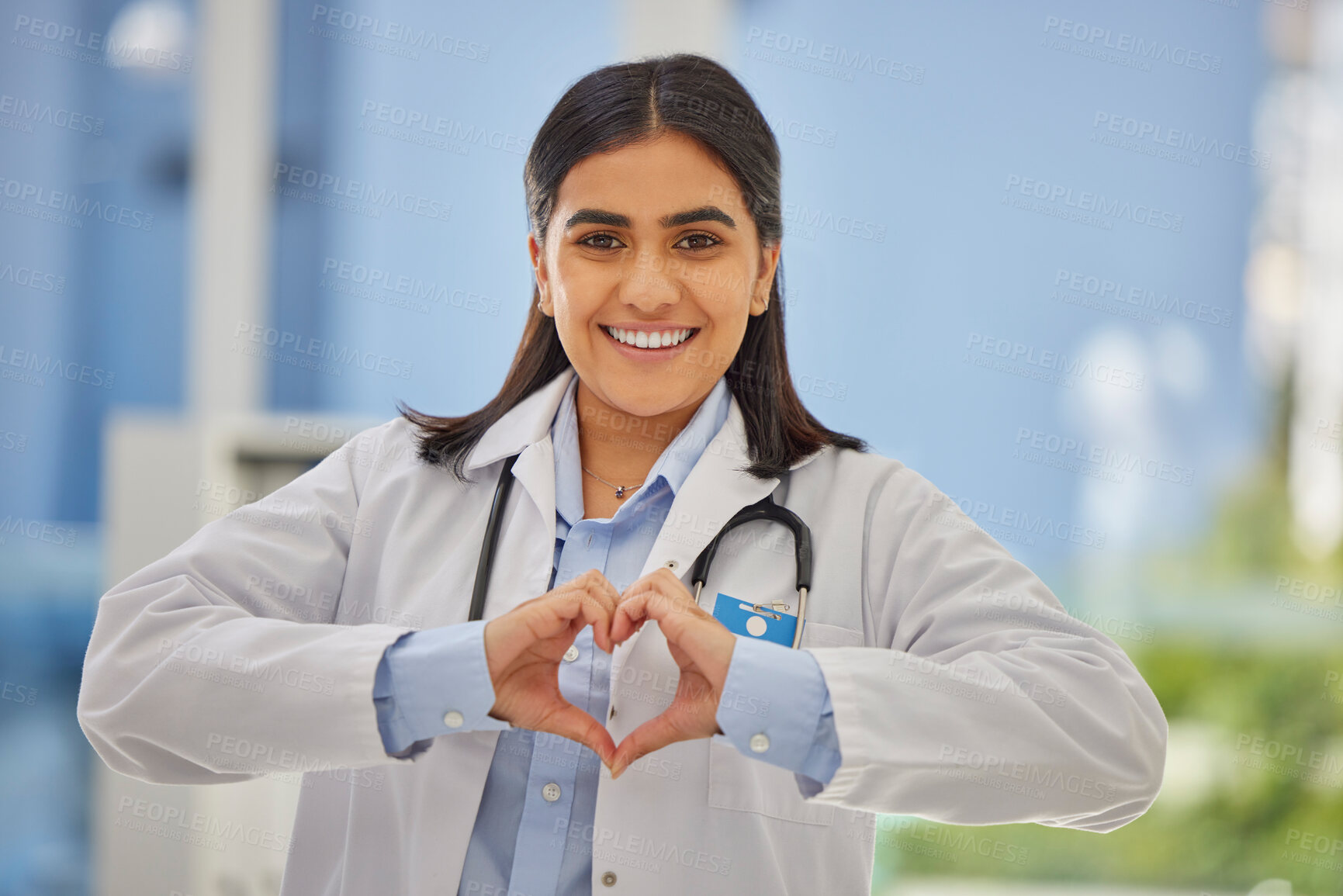 Buy stock photo Doctor, heart hands and portrait of woman in hospital with support, kindness and trust in healthcare. Health care, insurance and female medical professional with love hand gesture or emoji in clinic.