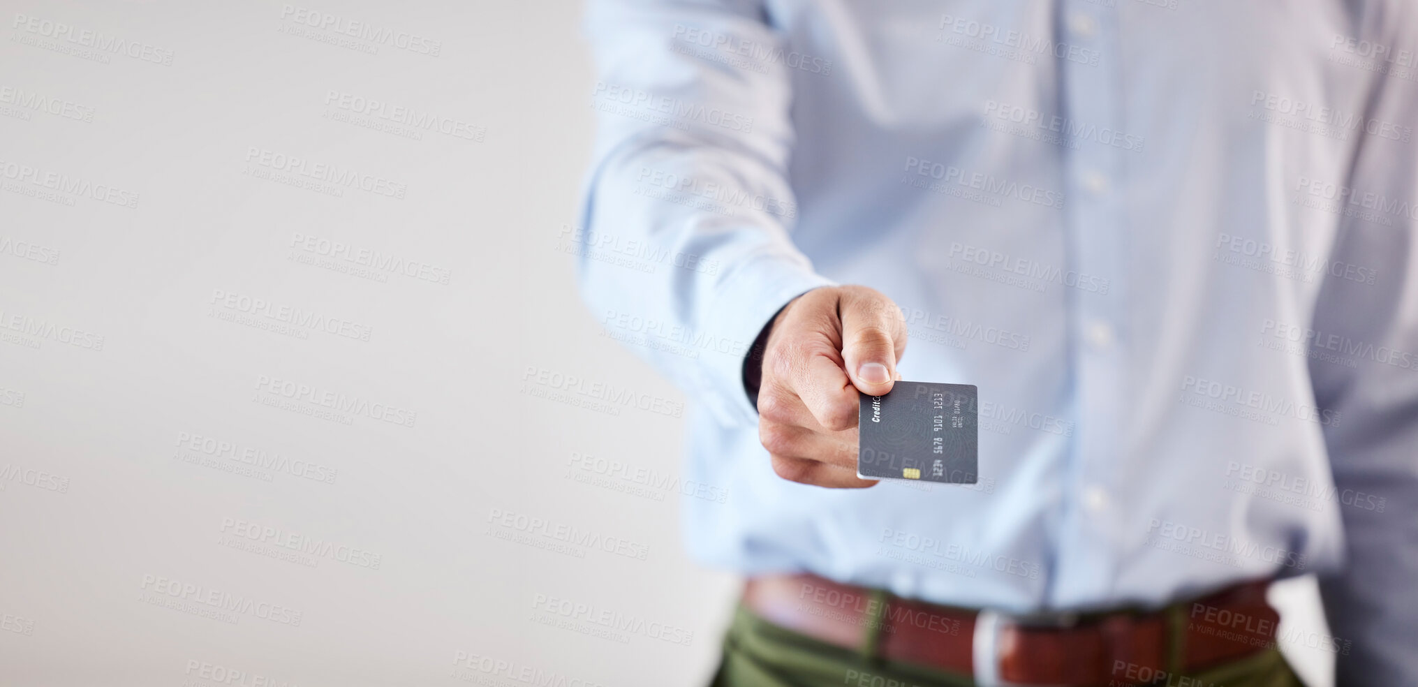 Buy stock photo Closeup of male hands giving credit card. Business man showing credit card mockup. Making payment