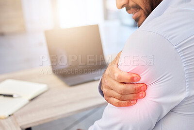 Buy stock photo Closeup of shoulder pain highlighted in red. A businessman holding his arm with an injury. Male employee working at his desk in a modern office and suffering from a medical problem