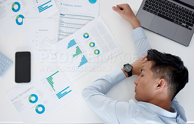 Buy stock photo Tired, asian man and sleeping with documents above in burnout, overworked or stress at office. Top view of exhausted businessman asleep on desk with paperwork in finance, demographics or company data
