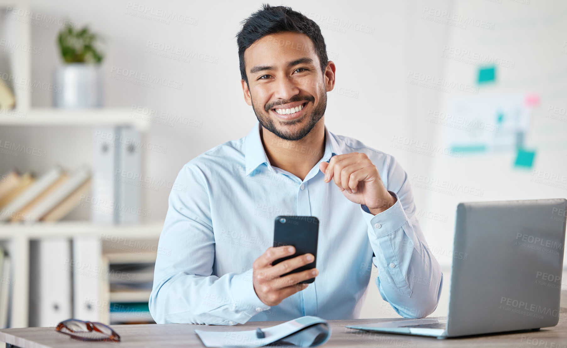 Buy stock photo Happy, phone and portrait of business man in a office with startup and technology. Motivation, smile and happiness of businessman with insurance agency work with mobile text and development at job