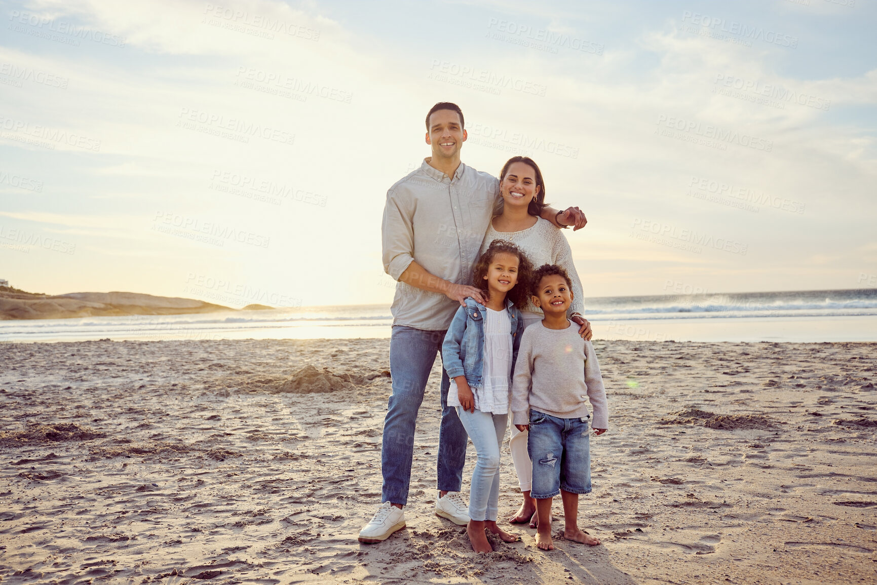 Buy stock photo Travel, beach and portrait of parents with children on holiday, summer vacation and weekend. Nature, sunset and happy mother, father and kids by ocean for bonding, adventure and quality time together