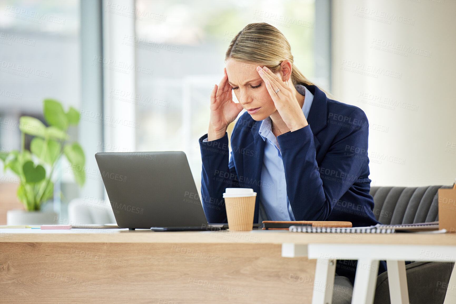 Buy stock photo Burnout, frustrated and female professional with a headache in a workplace on a laptop with entrepreneur. Fatigue, business person and anxiety with pain at company with depression and technology.