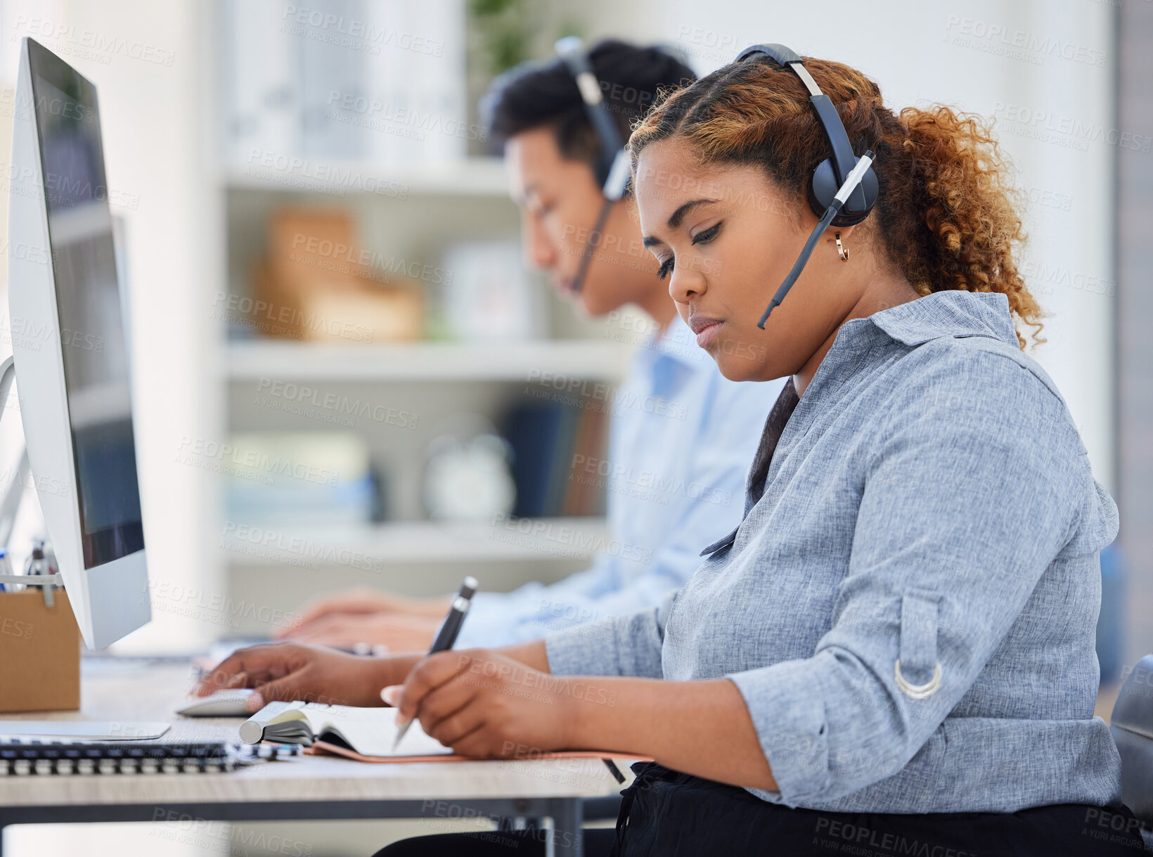 Buy stock photo Telemarketing, business woman and contact us writing in a office with paperwork at desk. Call center, African female employee and consulting of a worker with web support and agent advice notes