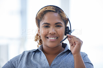 Portrait of one happy smiling african american call centre telemarketing agent talking on headset in office. Face of confident and friendly businesswoman operating helpdesk for customer service and sales support