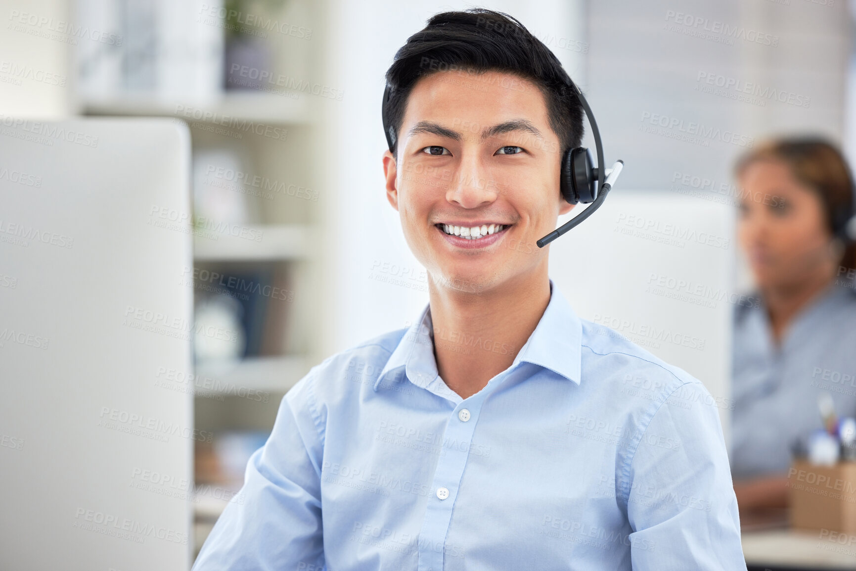 Buy stock photo Call center agent, man and smile in portrait, telemarketing and contact us or technical support. Asian person, customer service and headset for advice, crm communication and consultant or operator