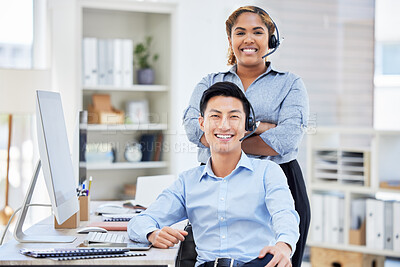 Portrait of call center colleagues showing diversity at the workplace. Businesspeople working customer service wearing headsets and smiling while training to be sales rep. IT people against copyspace
