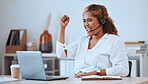 Happy and cheerful mixed race female call center agent cheering in support and working on a laptop in an office at work. Confident hispanic female boss smiling while celebrating a victory on a call