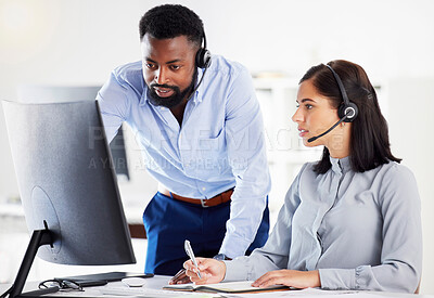 Buy stock photo Collaboration, mentor helping with colleague and headset with computer at her desk of modern office. Teamwork or support, partnership or communication and black man with intern at her workspace