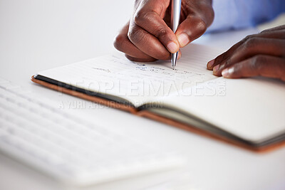 Buy stock photo Closeup, hands writing and notebook in office for brainstorming, ideas and focus on career goals. African man, book and pen for schedule, administration or agenda with planning, journal and notes