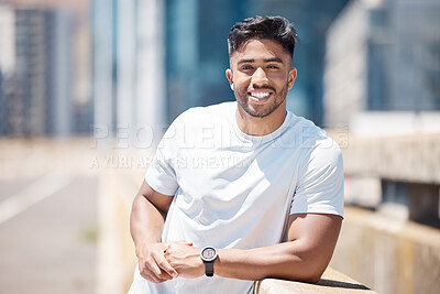 Buy stock photo Fitness, man and portrait in the city with break from running, workout and exercise outdoor. Urban, male person and Indian athlete with happiness, wellness and health from run for race in town