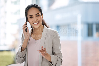 Buy stock photo Business woman talking on her phone. Female entrepreneur making a call on her smartphone. Portrait of smiling businesswoman on a phone call. Businesswoman in her office making a call on her mobile