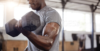 Buy stock photo Dumbbells, biceps and exercise with a black man at gym for fitness, training workout and strong muscle. African male athlete or bodybuilder with weights for power and performance at a wellness club 