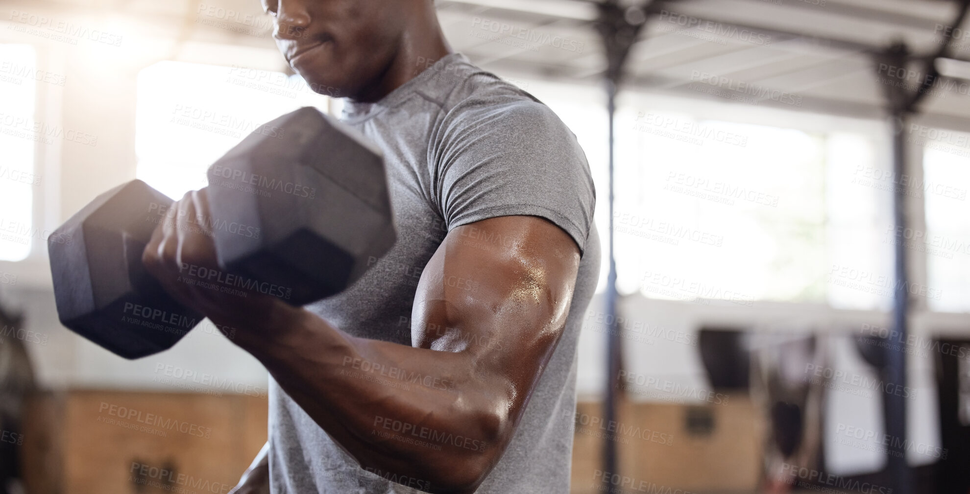 Buy stock photo Dumbbells, biceps and exercise with a black man at gym for fitness, training workout and strong muscle. African male athlete or bodybuilder with weights for power and performance at a wellness club 