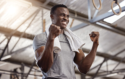 Buy stock photo Goals, success and fitness with a man at gym for exercise, training workout and strong muscle. African athlete or bodybuilder person celebrating with fist for power challenge win or achievement