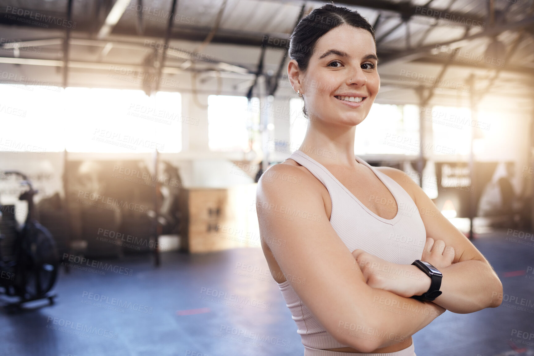 Buy stock photo Happy, arms crossed and exercise with a woman at gym for fitness, training workout and strong muscle. Portrait of athlete person with a smile for space, motivation and performance at wellness club 