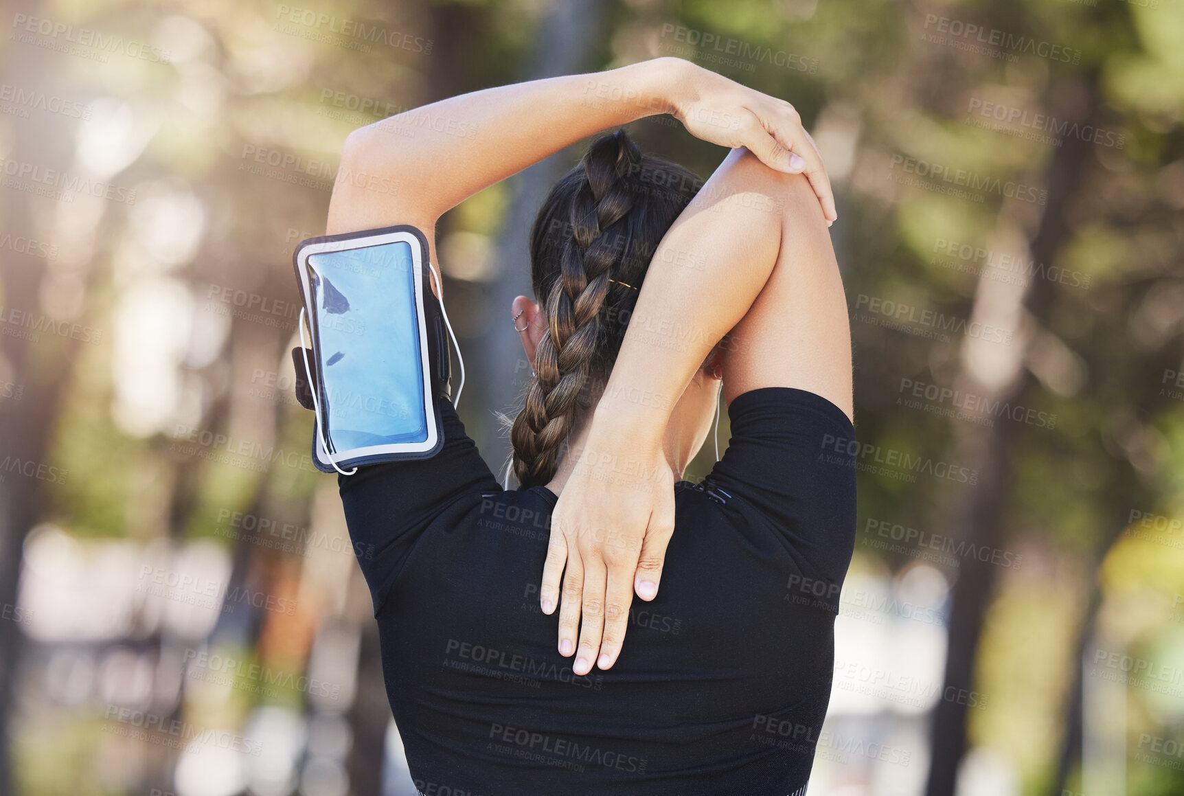 Buy stock photo Fitness, runner or woman stretching arms ready for workout, exercise or workout or body movement. Phone, back view of athlete or healthy girl in running warm up for flexibility or mobility in park 