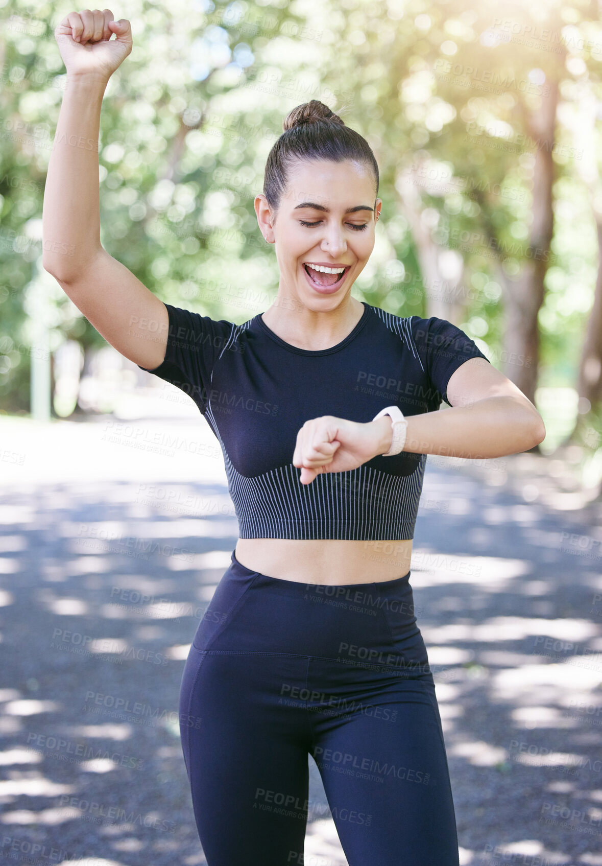 Buy stock photo Success, happy woman or athlete with smart watch in park for heart rate, training performance or exercise goals. Excited, yes or healthy sports girl with timer celebrates running workout or fitness