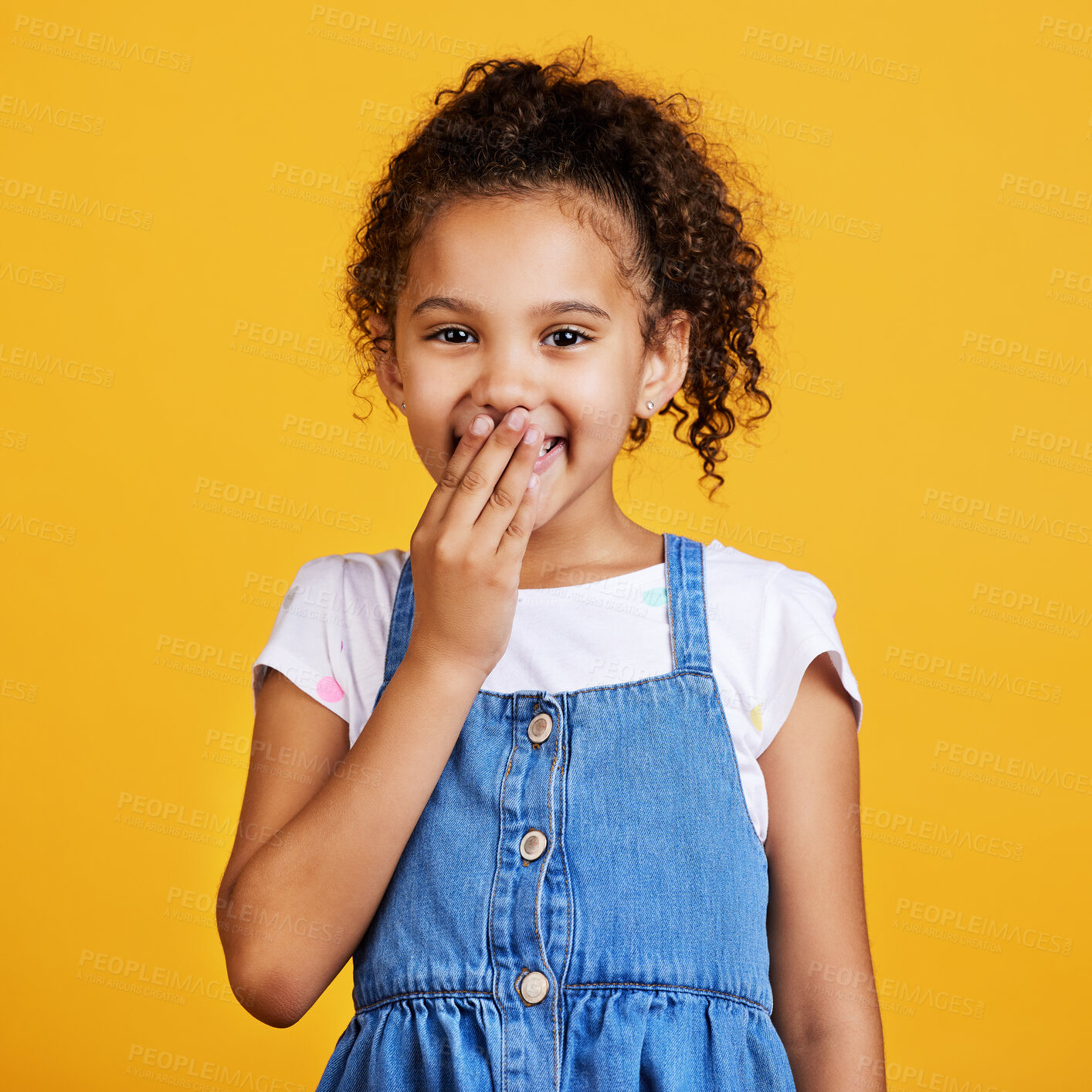 Buy stock photo Laughing, happy and portrait of a child in a studio with a comic funny joke and positive mindset. Happiness, smile and face of a girl kid model giggling for comedy while isolated by yellow background