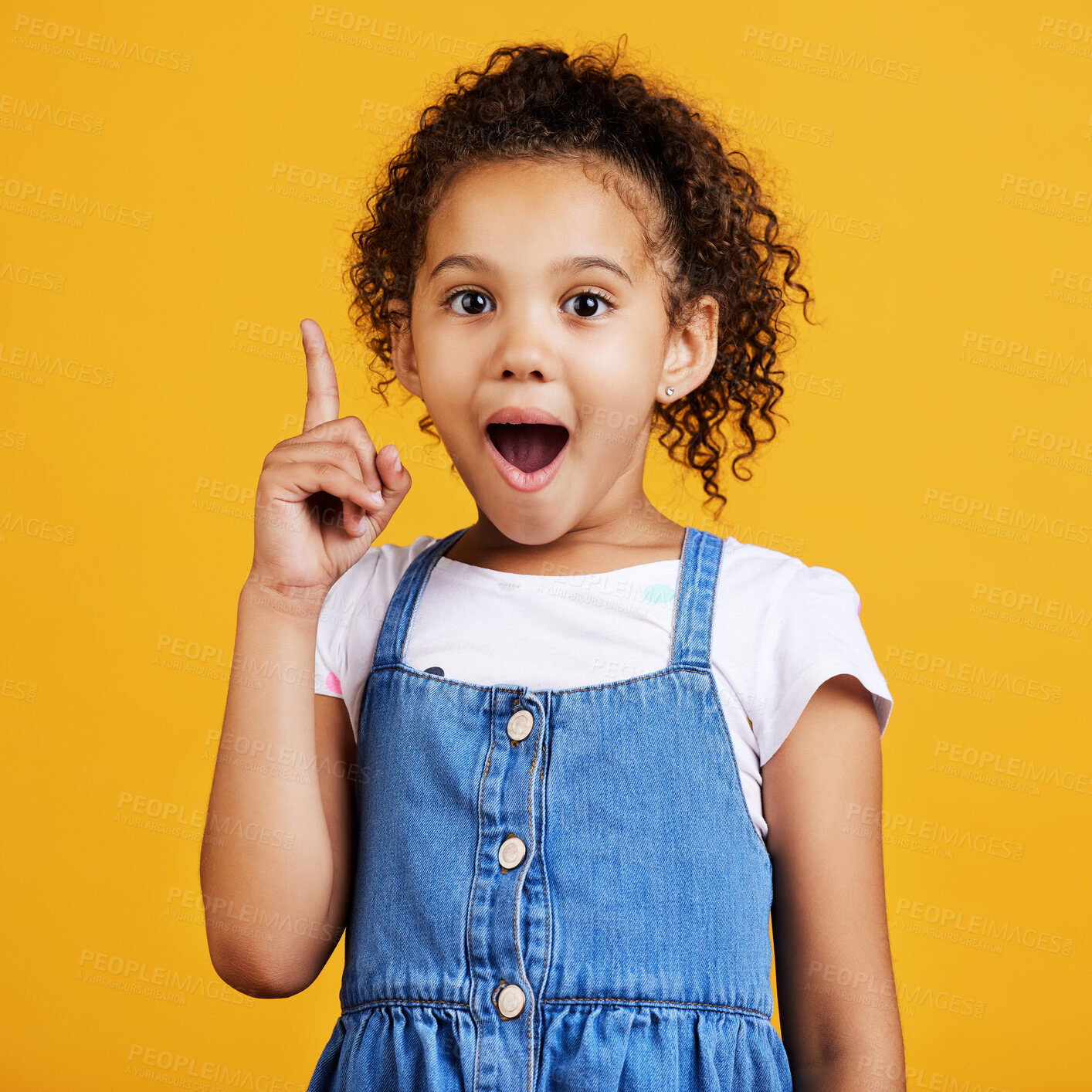 Buy stock photo Idea, surprise and portrait of a girl pointing isolated on a yellow studio background with shock. Plan, knowledge and happy little child with bright ideas, wow and smart planning gesturing to space