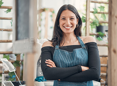 Buy stock photo Portrait of one happy young hispanic waitress standing with her arms crossed in a store or cafe. Friendly woman and coffeeshop owner managing a successful restaurant startup