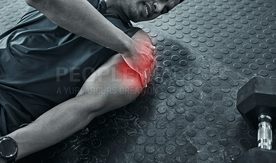 Buy stock photo injured trainer lying on the floor in the gym. Trainer in pain in the arm. Fit athlete suffering with shoulder strain during a workout. Discomfort and pain in the bicep is common when exercising