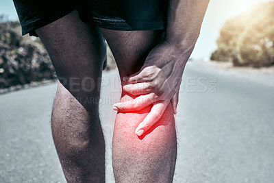 Closeup fit mixed race man holding his knee in pain while exercising outdoors. Unrecognizable male athlete suffering with a joint injury highlighted by glowing cgi. You can get hurt during a workout