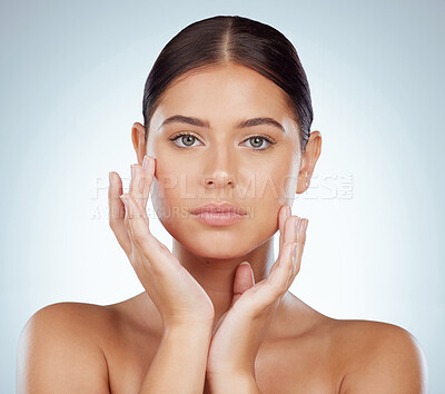 Buy stock photo Serious face, skincare and beauty of woman in studio isolated on a white background. Portrait, natural and female model in makeup, cosmetics or facial treatment for skin health, aesthetic or wellness