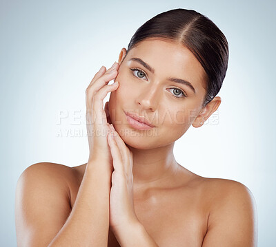 Buy stock photo Face, skincare and hands of woman in studio isolated on white background. Portrait, natural beauty and serious female model in makeup, cosmetics or facial treatment for health, aesthetic or wellness