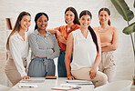 Portrait of a group of confident diverse business women posing together in an office boardroom. Happy smiling colleagues motivated and dedicated to success. Cheerful and ambitious staff working in a creative startup agency