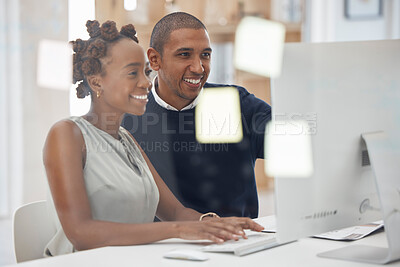 Buy stock photo Collaboration, colleagues working together and at computer in their modern workplace office. Teamwork or partnership, support or and mentor with coworker at her pc typing with help at workstation
