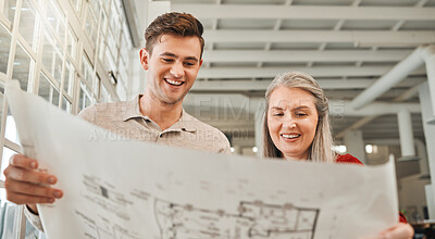 Buy stock photo Mature architect discussing blueprint with colleague. Mature businesswoman collaborating with a coworker on building plan.  Professional designers plan a project together. Designers planning a project